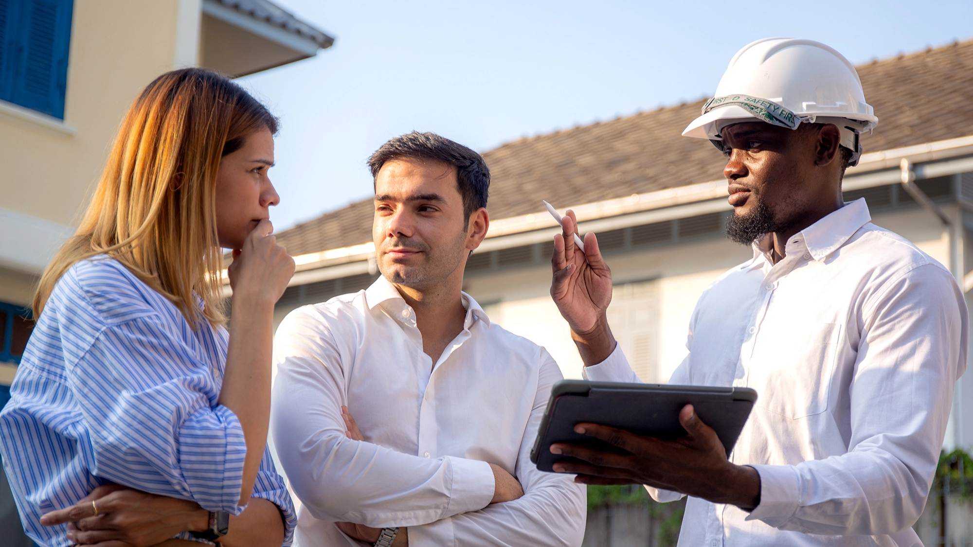 Group engineer team meeting discussing and planning for design with interior designer about project in construction site, architect team development and examining together, industrial and worker.