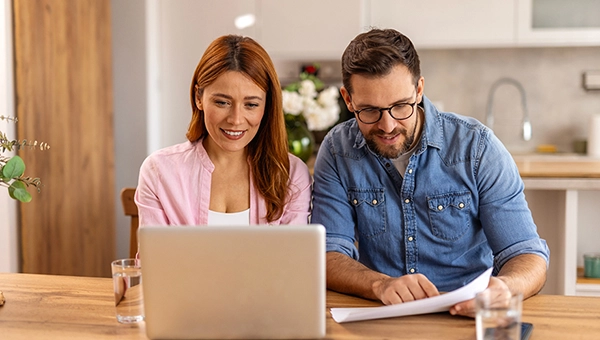 Couple discussing their finance in the kitchen